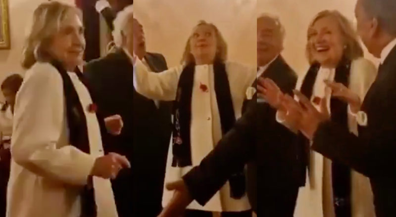  Un videoclip jenant o arată pe Hillary Clinton încercând dansul „La Macarena” la petrecere